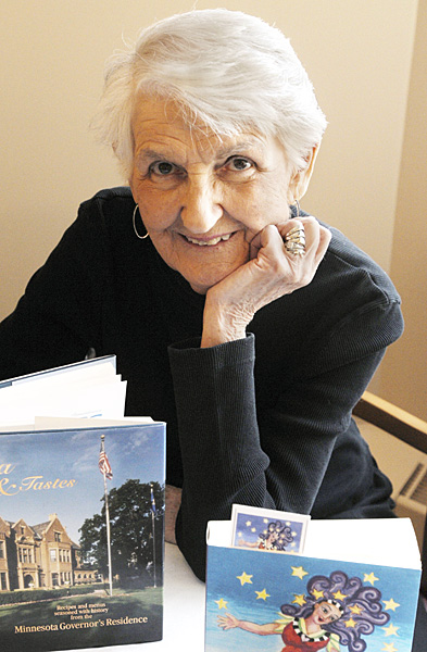 Jean Steiner poses with her books. Steiner transformed the "Office of House Public Information" into a permanent and valued fixture at the House. (Photo by Andrew VonBank)