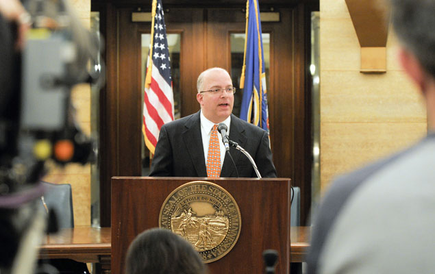 Finance Commissioner Tom Hanson presents the February Forecast to media members and other interested parties Feb. 28. (Photo by Andrew VonBank)