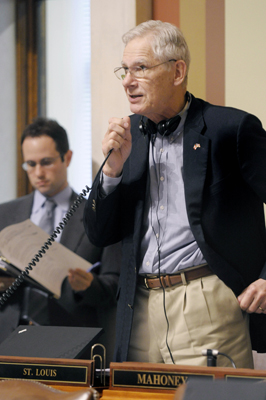 Rep. Thomas Huntley presents an overview of the health reform bill May 12. It was vetoed by the governor May 13. (Photo by Tom Olmscheid)