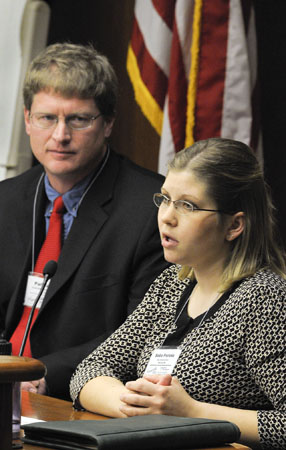 Pat Lunemann, left, president of the Minnesota Milk Producers Association, and Sadie Frericks, a dairy farmer from Melrose, speak to the House Agriculture, Rural Economies and Veterans Affairs Finance Division Feb. 10 about the state of the Minnesota dairy industry. (Photo by Andrew VonBank)