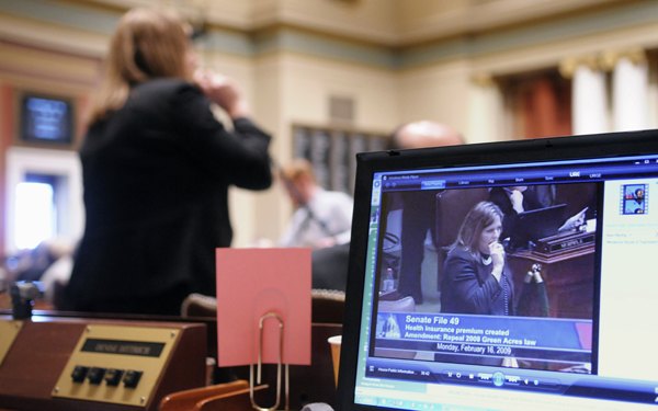 Rep. Ann Lenczewski  is viewed on a computer in the House Chamber  as she speaks in support of a bill that makes changes to the 2008 tax law as specified in an agreement between legislative leaders and the governor following adjournment last May. The bill passed the House 77-52 on Feb. 16. (Photo by Tom Olmscheid)