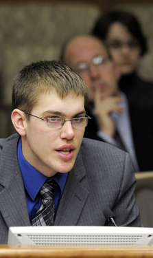 Ryan Anderson, Minnesota State University, Mankato student body president, testifies before the House State and Local Government Operations Reform, Technology and Elections Committee March 10 in support of a bill that would authorize early voting. (Photo by Andrew VonBank)