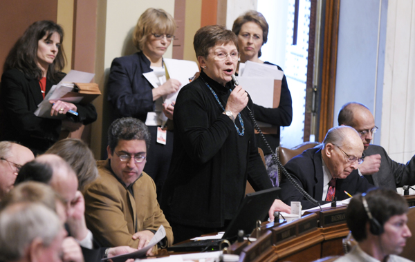 Rep. Alice Hausman (DFL-St. Paul) explains the omnibus capital investment bill, which she sponsors, on the House floor April 6. (Photo by Tom Olmscheid)