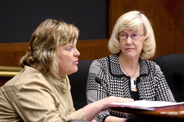 Barb Anderson, a former teacher, listens as Lorie Alveshere, policy director for the Minnesota Organization on Adolescent Pregnancy, Prevention and Parenting, tells the House K-12 Education Policy and Oversight Committee that 22 states have abandoned an abstinence-only curriculum of sex education. (Photo by Tom Olmscheid)