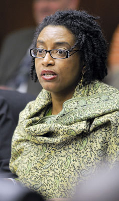 Natalie Johnson Lee, executive director of the Minnesota African/African-American Tobacco Education Network, testifies before the House Health Care and Human Services Policy and Oversight Committee March 17 in support of a bill that would prohibit smoking in a vehicle transporting a child. (Photo by Tom Olmscheid)