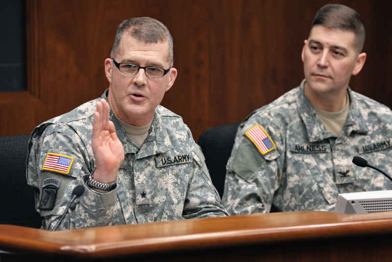 Brig. Gen. Joe Kelly, assistant adjutant general of the Minnesota National Guard, left, tells the House Veterans Services Division that all soldiers take two oaths when sworn into the Minnesota National Guard: one to uphold the U.S. Constitution and the other to uphold the state constitution. (Photo by Tom Olmscheid)