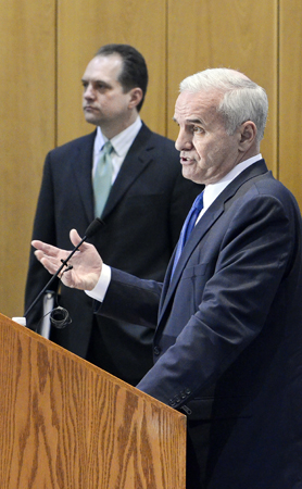 Gov. Mark Dayton presents his biennial budget at a Feb. 15 press conference at the Department of Revenue. Dayton was joined by Minnesota Management & Budget Commissioner Jim Schowalter, background, and other members of his cabinet. (Photo by Andrew VonBank)