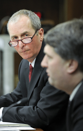 David Crist, deputy corrections commissioner, testifies before the House Civil Law Committee March 14 during discussion of a bill that would require private prison housing requests by the commissioner of corrections. Rep. Torrey Westrom, right, sponsors the bill. (Photo by Andrew VonBank)