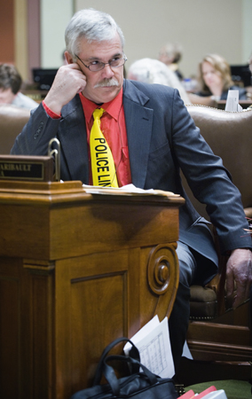 Rep. Tony Cornish listens as House members debate the combined omnibus public safety and judiciary finance bills. (Photo by Tom Olmscheid)