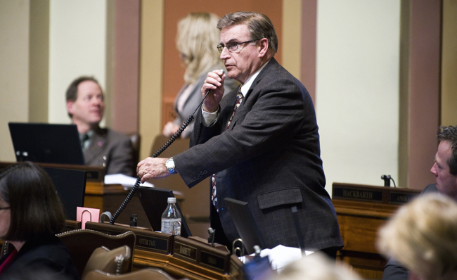 Rep. Bud Nornes presents the omnibus higher education finance bill on the House floor March 29. The bill was approved 69-60. (Photo by Tom Olmscheid)