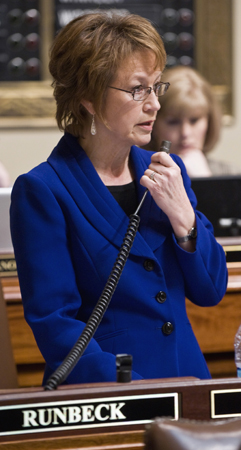 Rep. Linda Runbeck, chairwoman of the House Property and Local Tax Division, explains the property tax section of the proposed omnibus tax bill March 28 on the House floor. (Photo by Tom Olmscheid)