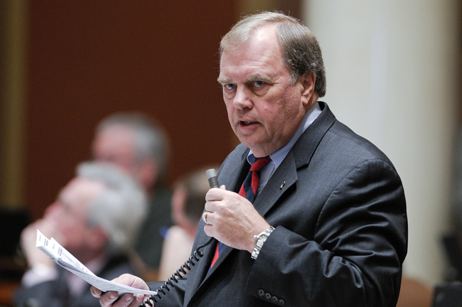 Rep. Morrie Lanning responds to a question on the House floor during the April 6 debate on the omnibus state government finance bill. (Photo by Andrew VonBank)