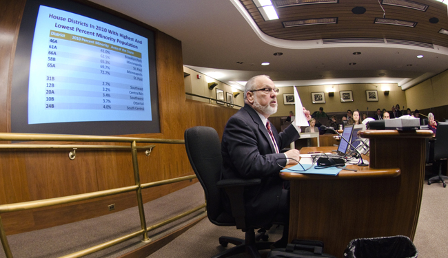 State Demographer Tom Gillaspy answers a question about House districts with the highest and lowest minority populations during a March 29 meeting of the House Redistricting Committee. (Photo by Tom Olmscheid)