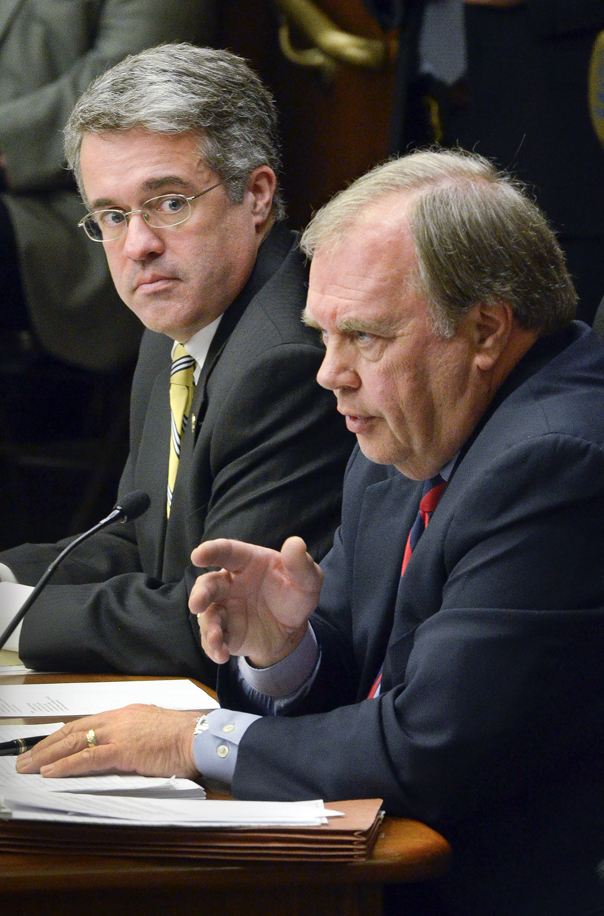 Rep. Morrie Lanning, right, and Rep. Terry Morrow testify before the House Government Operations and Elections Committee April 16 in support of a bill that would provide a stadium for the Minnesota Vikings.  Lanning is sponsor of the bill. (Photo by Andrew VonBank)