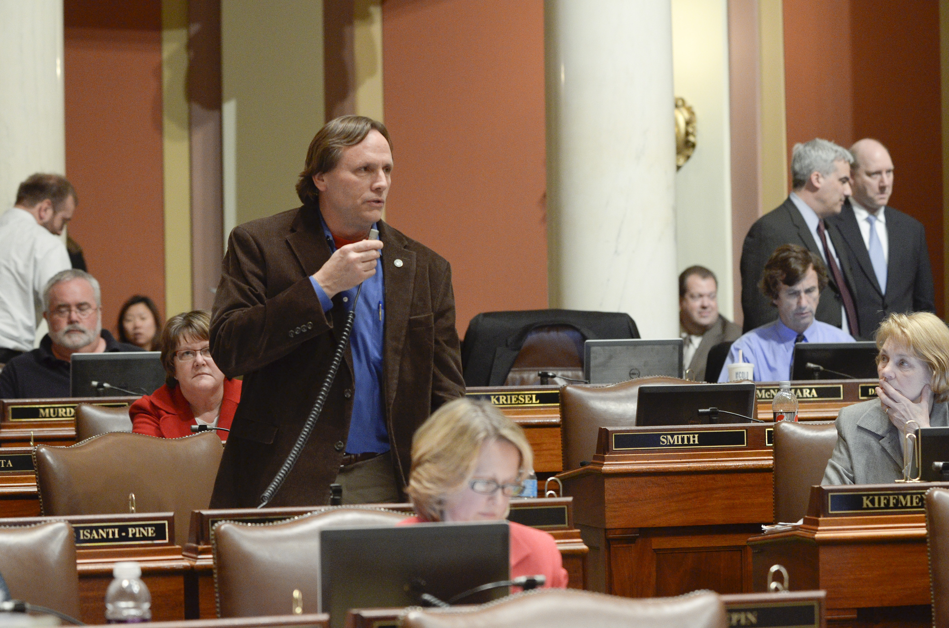 Rep. Jim Abeler presents the omnibus health and human services finance bill March 29 on the House floor. (Photo by Andrew VonBank)