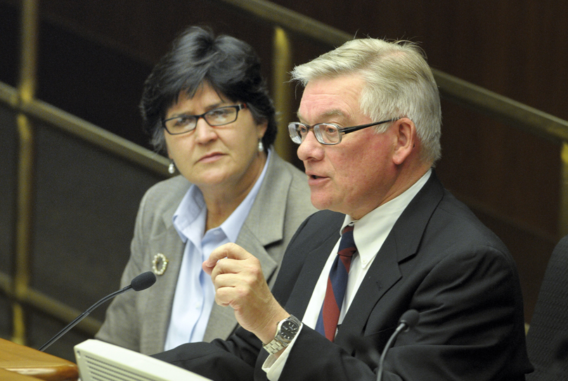Judge Jeffrey Thompson, right, and Judge Teresa Warner, left, testify March 28 before a joint meeting of the House Judiciary Policy and Finance and Civil Law committees during an informational hearing on a pair of bills that would modify mandatory retirement age for judges and eliminate the incumbency designation on the ballot for judicial offices. (Photo by Andrew VonBank)